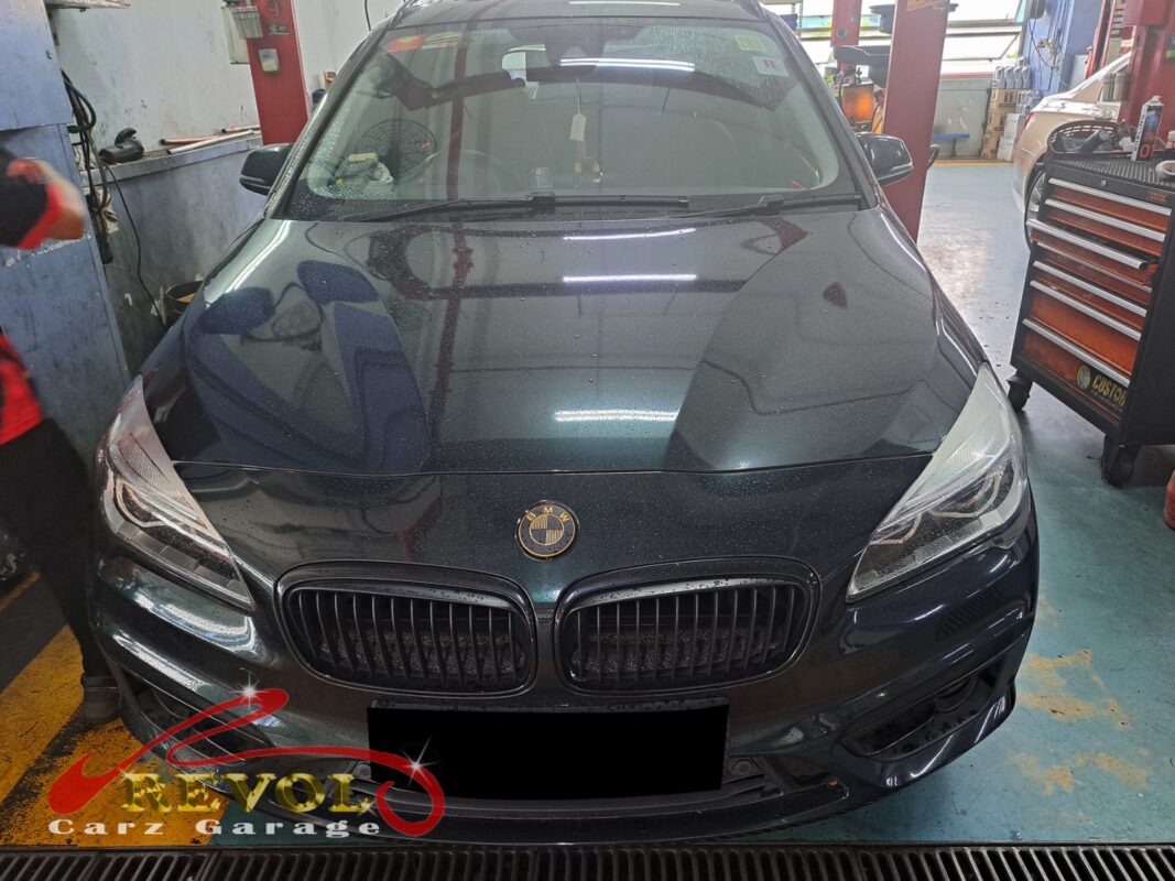 BMW 216d parked at the workshop, in for an engine noise inspection.
