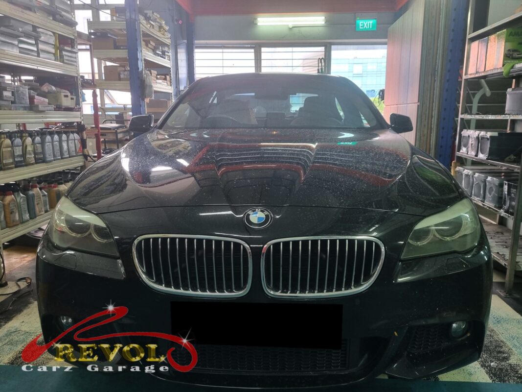 BMW 523i parked at the workshop, in for fuel pump inspection.