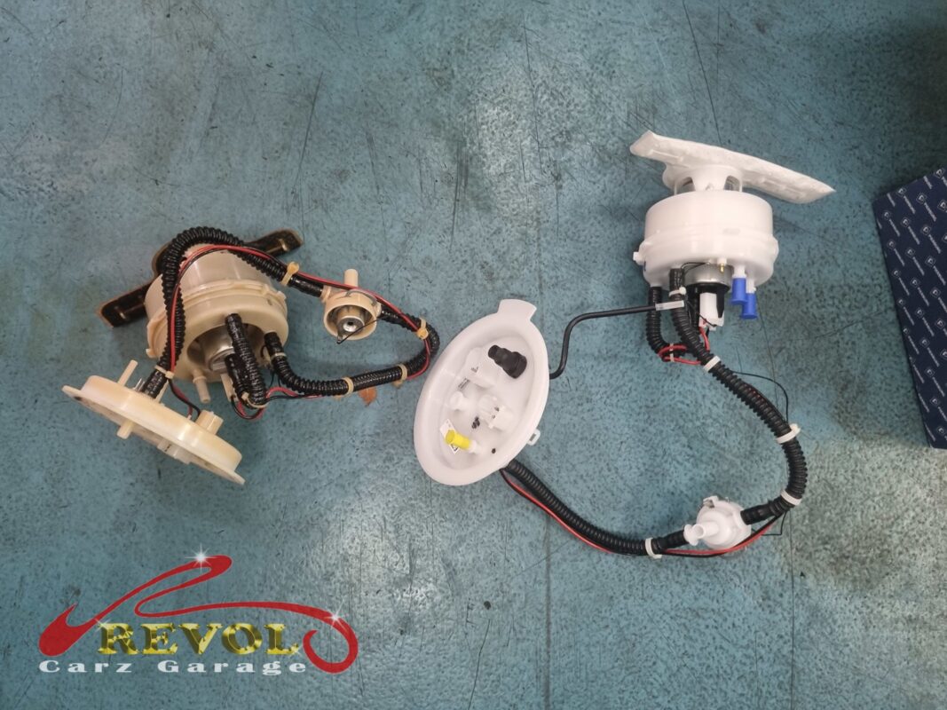 The fuel pump module accessed through the hatch on the BMW 523i.