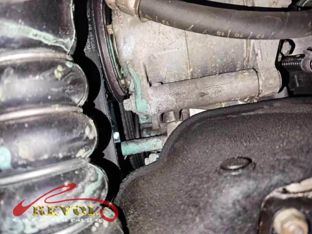 The old water pump removed from the engine.