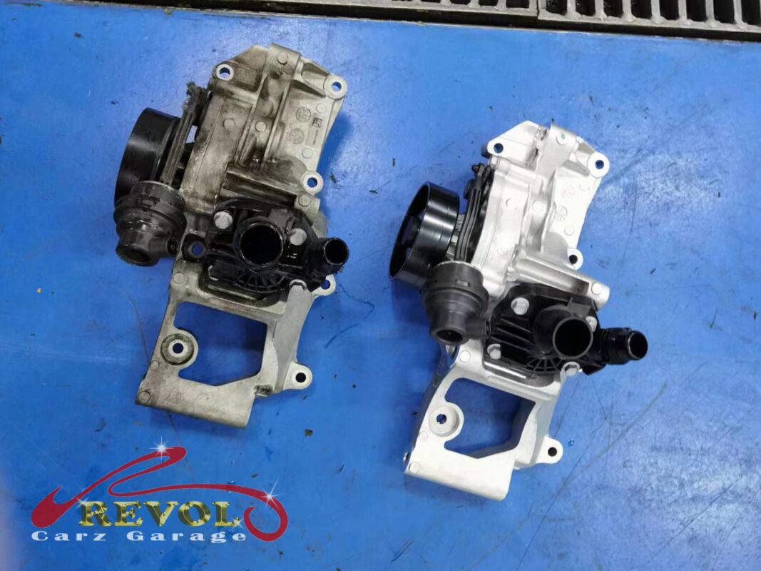 The new BMW-spec water pump and thermostat ready to fit.