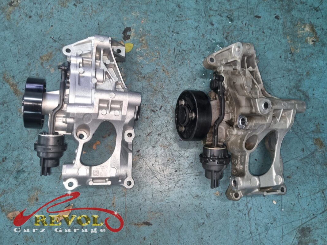 The old electric water pump removed from the engine.