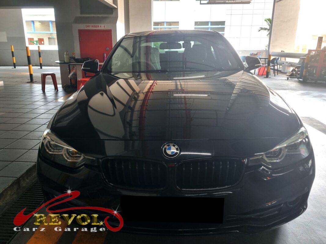BMW 320i on the lift for rear shock absorber replacement.