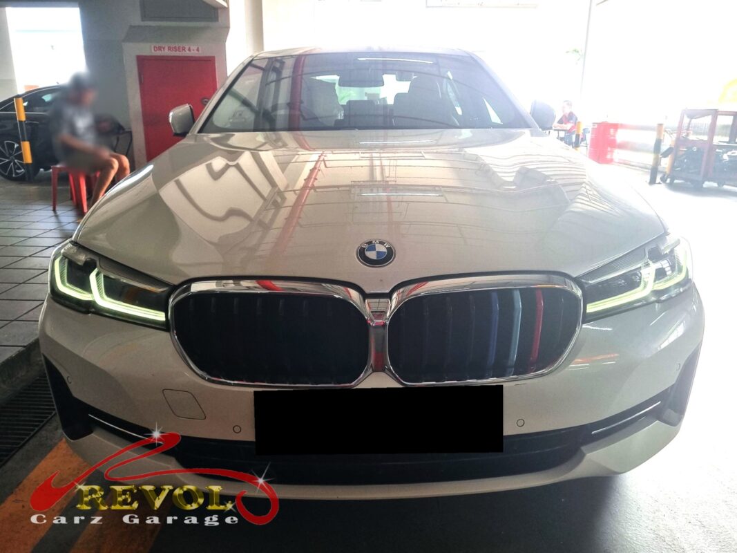BMW 520i on the workshop lift for long shaft mounting replacement.