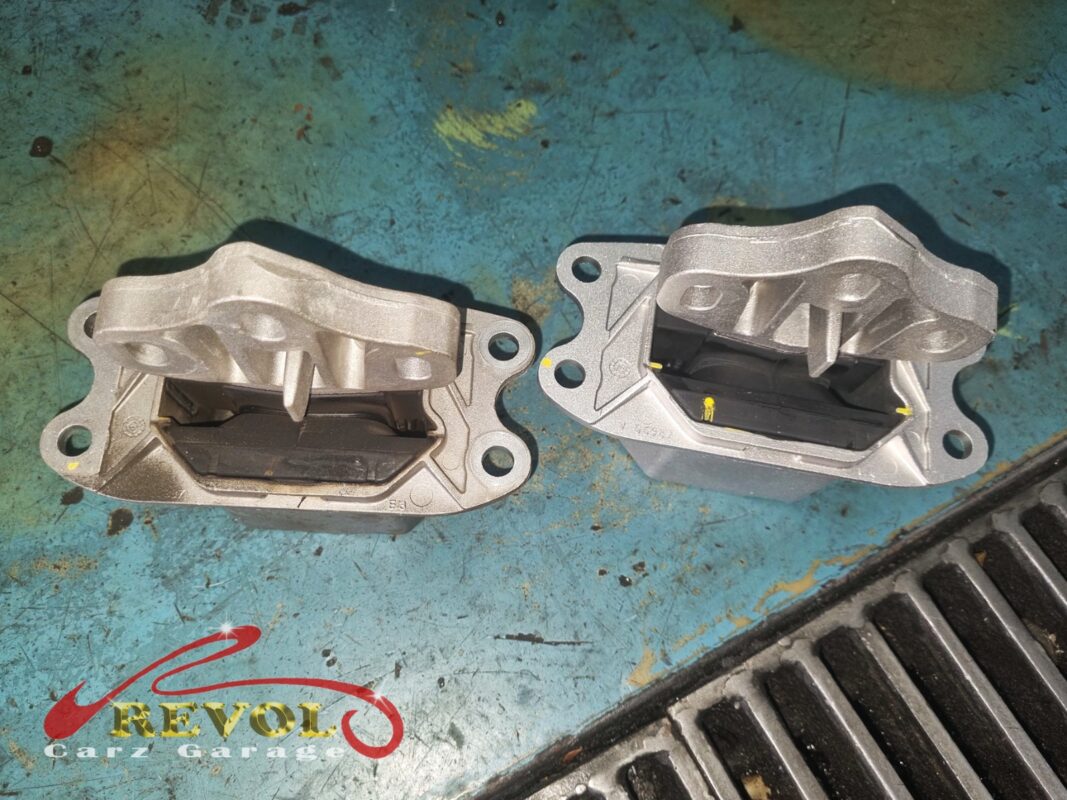 The new BMW-spec engine and gearbox mounts, fresh rubber and clean castings, ready to go in.