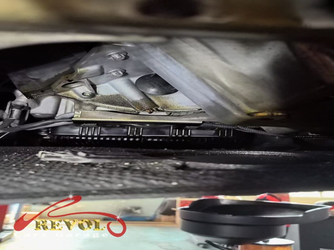 Oil tracking down from the bellhousing seam, the giveaway for a failed rear main seal.