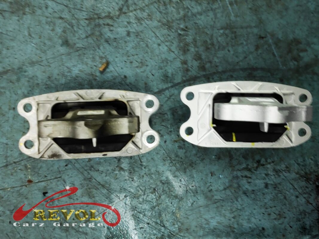 Engine and gearbox mounts from the set, old and new side by side.