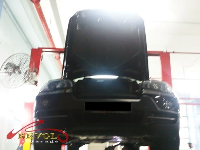 BMW X5 at the workshop, in with water-damaged electronic modules.