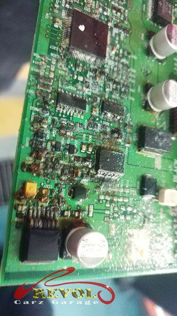 The protective cover that was left off, which let rain water seep into the battery compartment.
