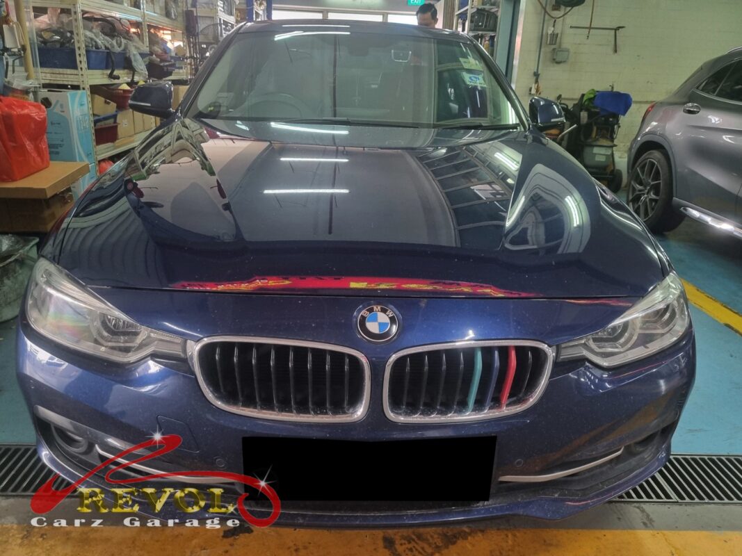 BMW 318i in for diagnosis of a false low-oil warning.
