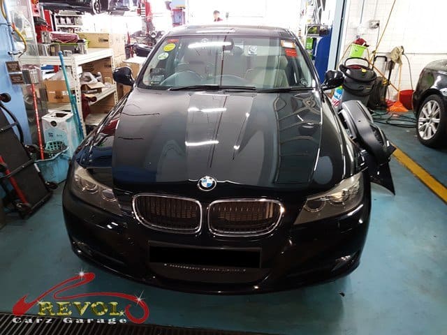 The transmission pan off, the failed sensor identified, the new genuine BMW-spec sensor and filter ready to fit.