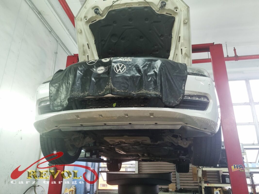The 640i up on the two-post lift, in for the misfire.