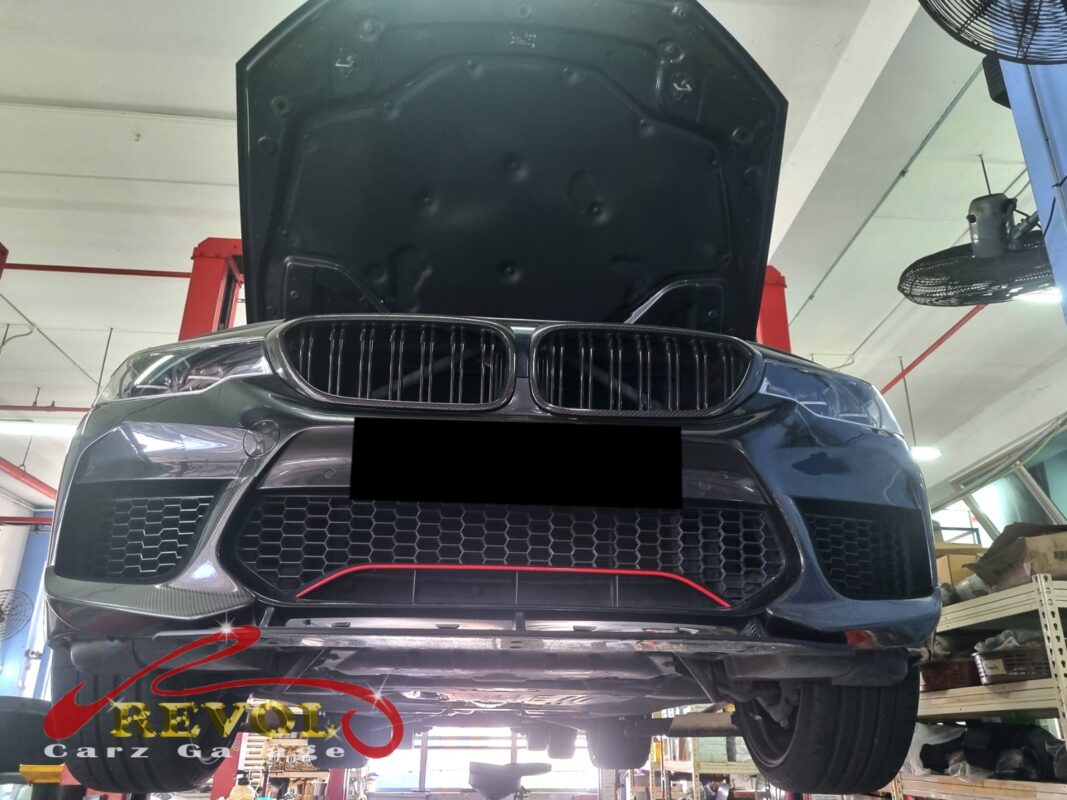 The 530i up on the two-post lift for its full service.