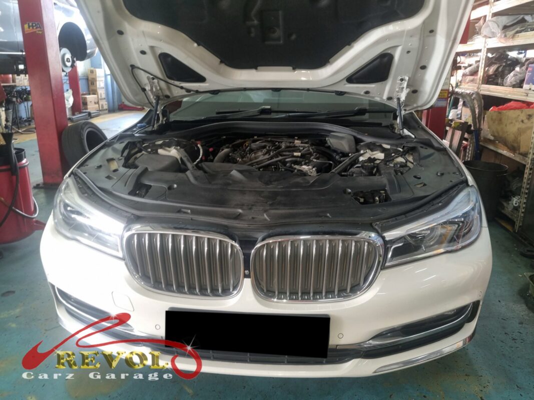BMW 730Li parked at the Revol Carz workshop ready for cooling system inspection.
