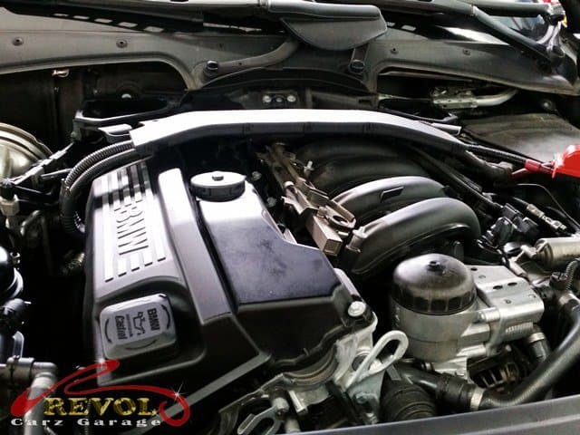 The valve cover removed to reach the valve stem seals.