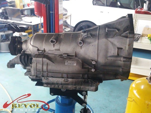 The transmission inspected, the leak traced beyond a worn seal.