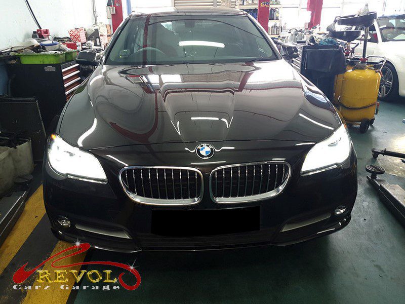 BMW 520i at the workshop, in for power loss and rough running.