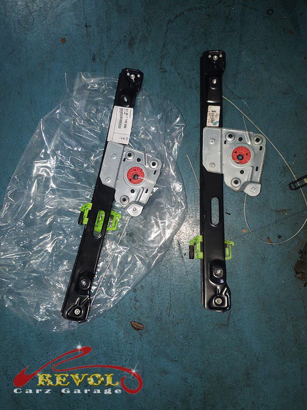 The new genuine BMW-spec window regulator ready to fit.