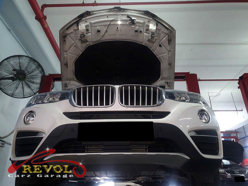 The front suspension checked on the lift, finding play in the control arms.