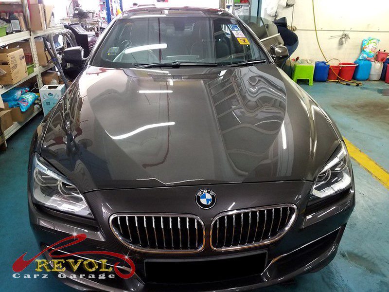 BMW 640i parked at the workshop for a service and front suspension work.