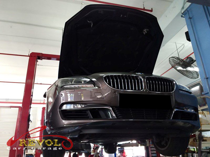 The engine oil and filter changed on the BMW 640i.