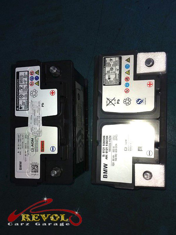 The old worn battery removed from the car.