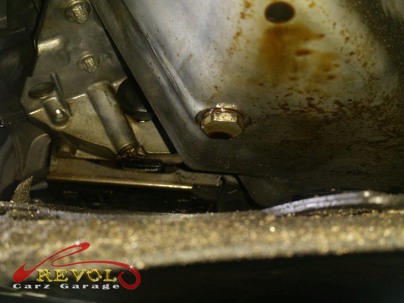 The oil filter housing removed showing the hardened gasket.