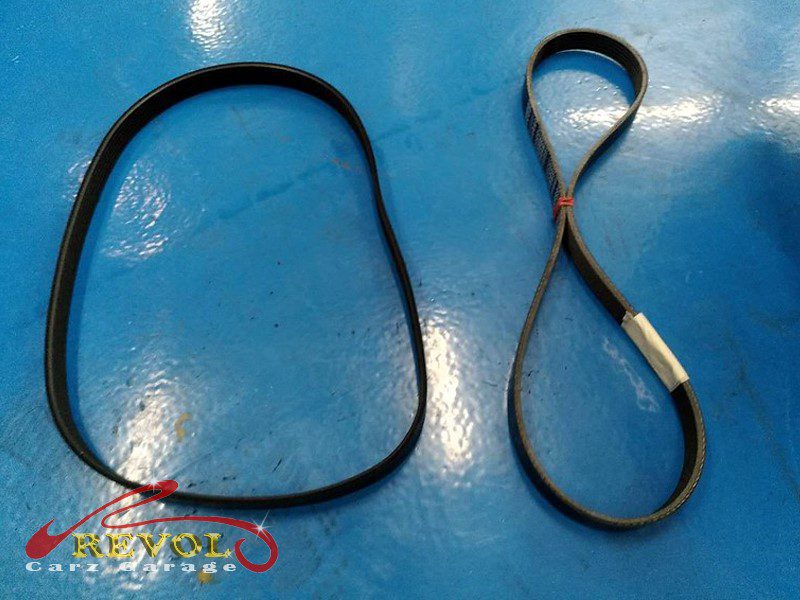 The new genuine BMW-spec drive belt, tensioner and idlers ready to fit.