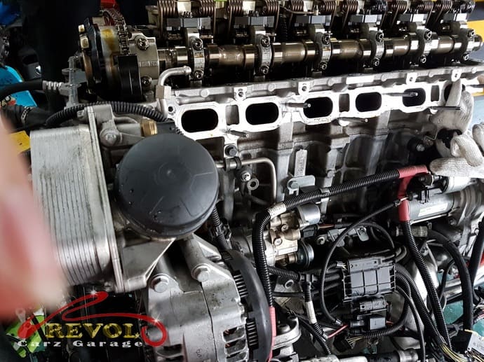 The engine overhaul beginning, the unit on the bench.