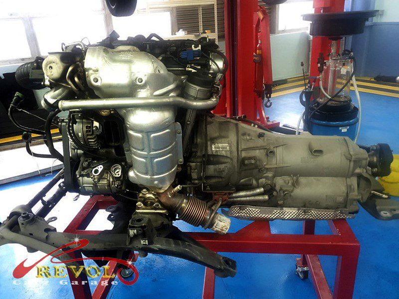 The engine stripped down, the head off and the bottom end open.