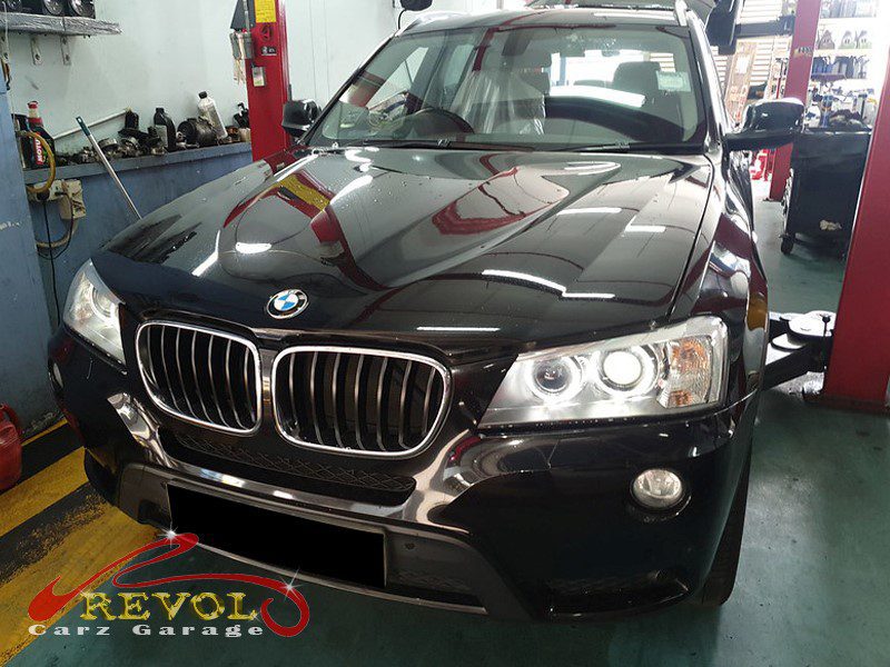 BMW X3 parked at the workshop, in for a valve cover oil leak diagnosis.
