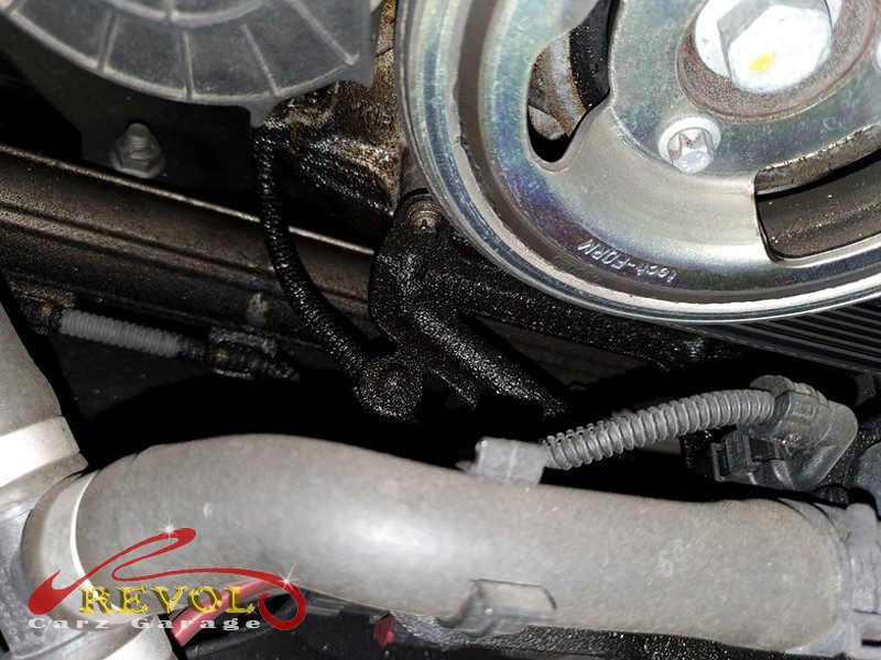 The oil filter housing removed showing the hardened gasket.