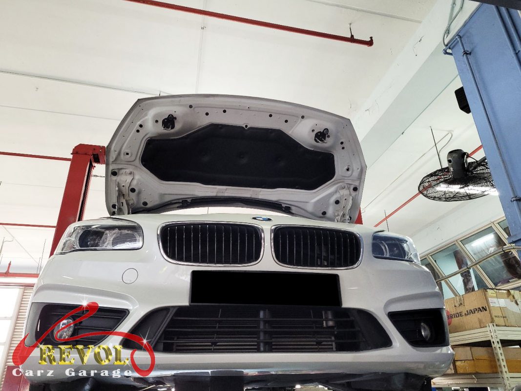 The engine oil and filter changed on the BMW 218i.