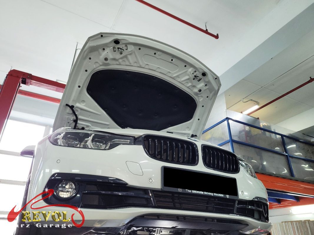 The engine oil and filter changed on the BMW 318i.