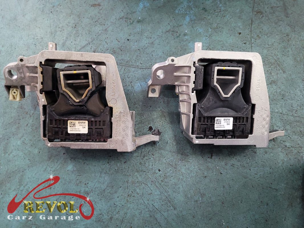 The gearbox mount removed showing the play under load.