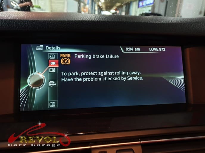 BMW 5 Series at the workshop, in with a parking brake fault code.