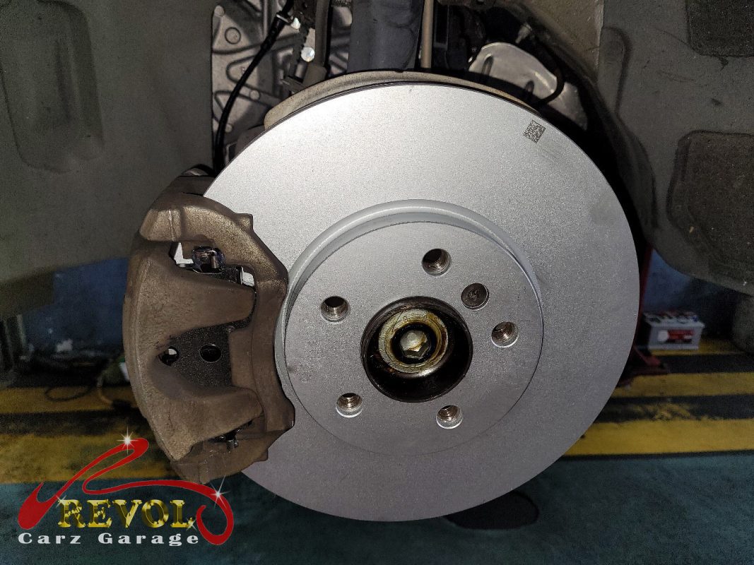 The new BMW-spec front discs and pads ready to fit.