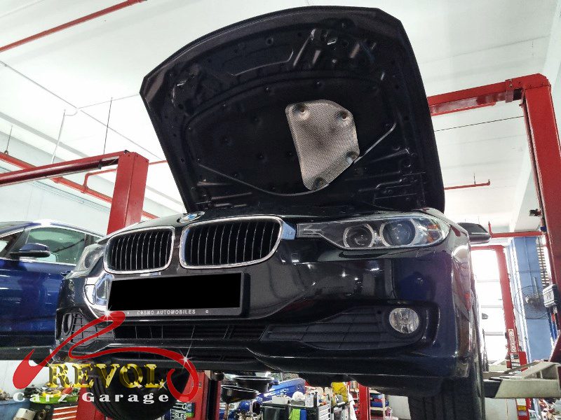 BMW 316i parked at the workshop, in for a coolant leak diagnosis.
