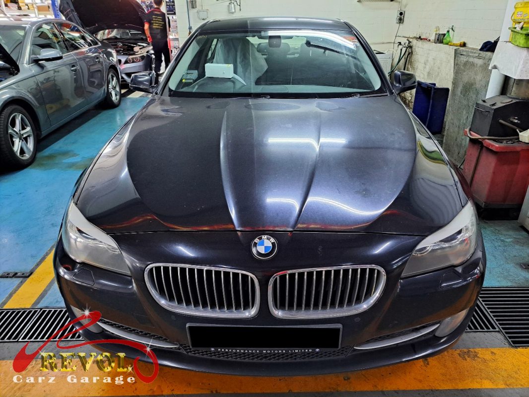 BMW 520i parked at the workshop, in for door handle repair.