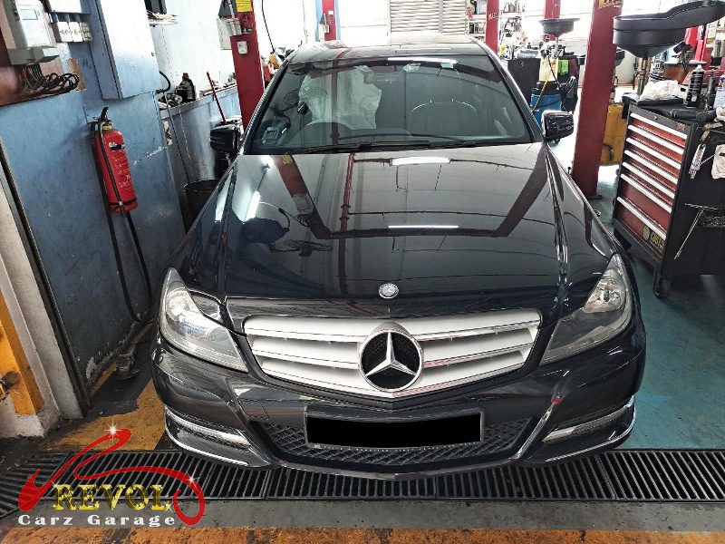 Mercedes-Benz C180 parked at the workshop, in for front brake inspection.