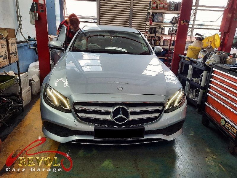 Mercedes-Benz E200 parked at the workshop, in for a fuel flap lock repair.