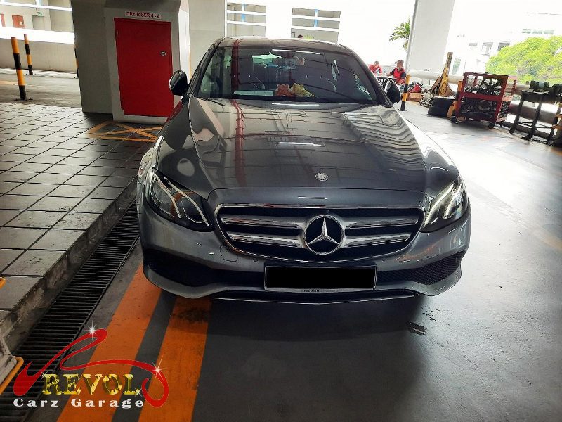 Mercedes-Benz E200 parked at the workshop for maintenance servicing.