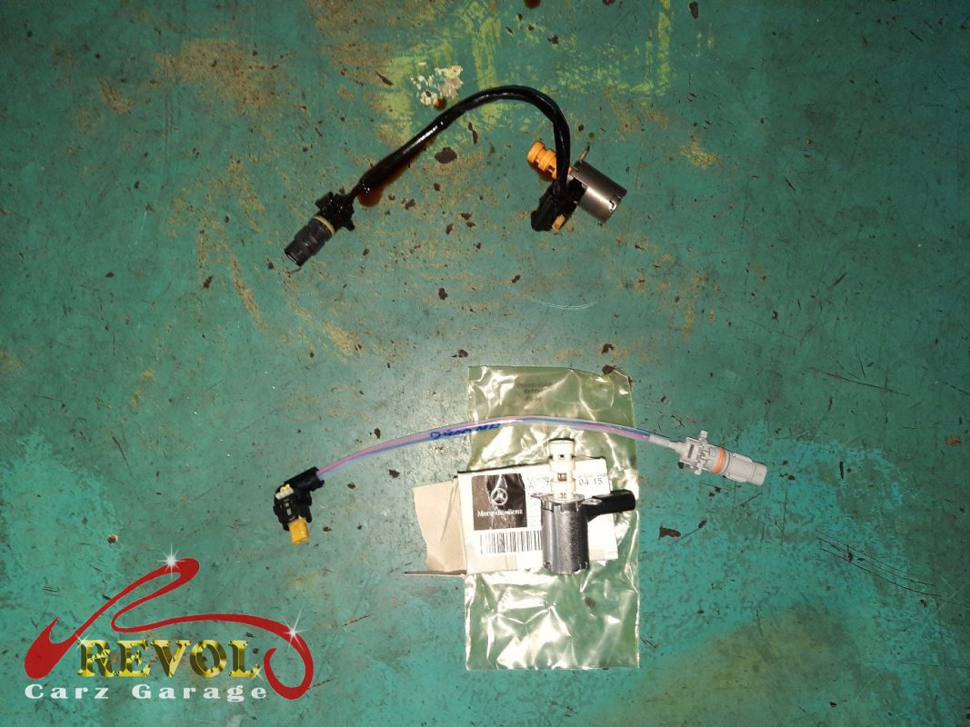 The faulty oil control valve removed from the engine.