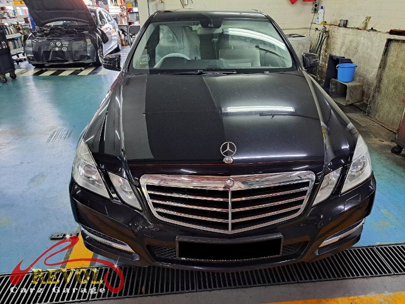 Mercedes-Benz E350 parked at the workshop for maintenance, aircon compressor and front brake work.