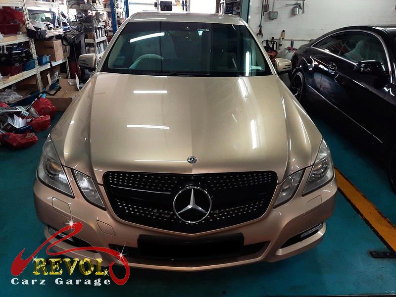 Mercedes-Benz E250 parked at the workshop for a transmission fluid service.