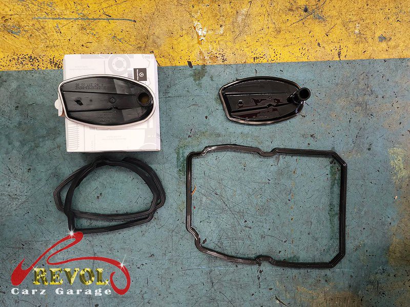 The transmission pan dropped and the old filter removed.