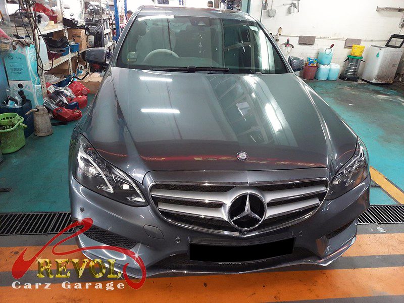Mercedes-Benz E200 parked at the workshop, in for front brake inspection.