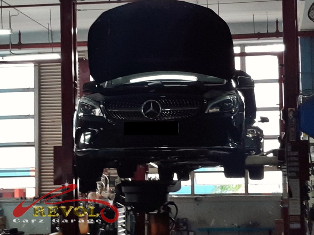 The old transmission fluid drained from the Mercedes-Benz CLA.