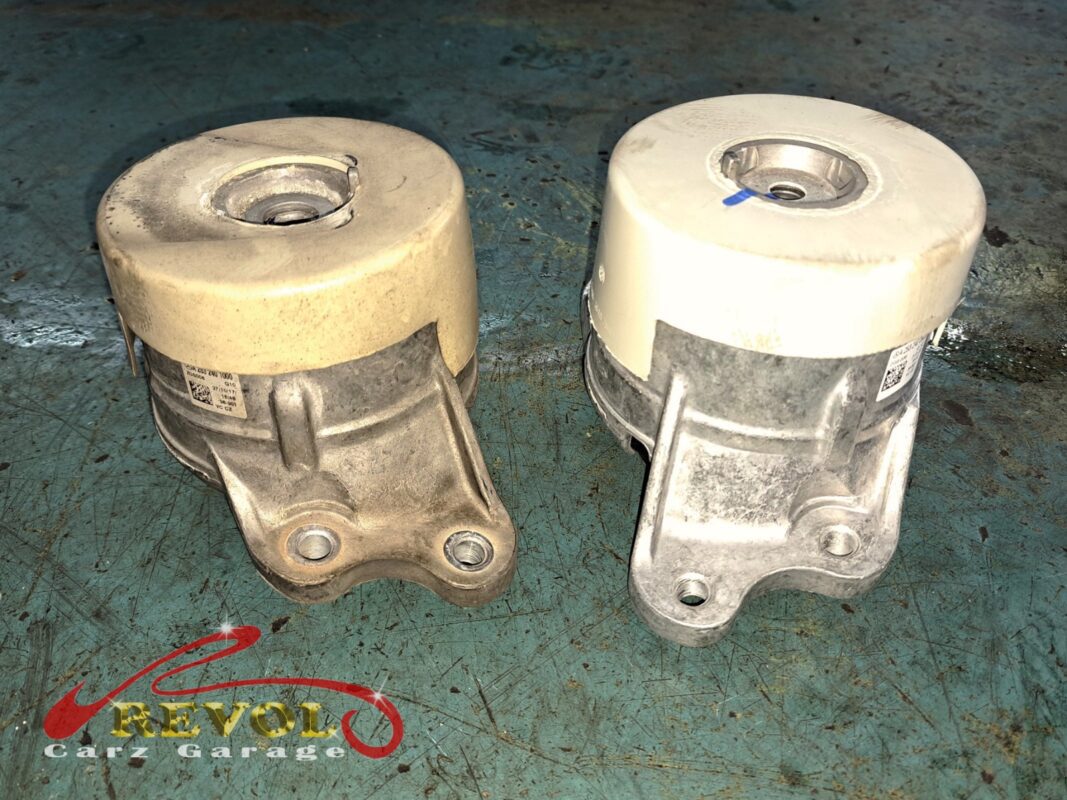 The gearbox mount removed showing the play under load.