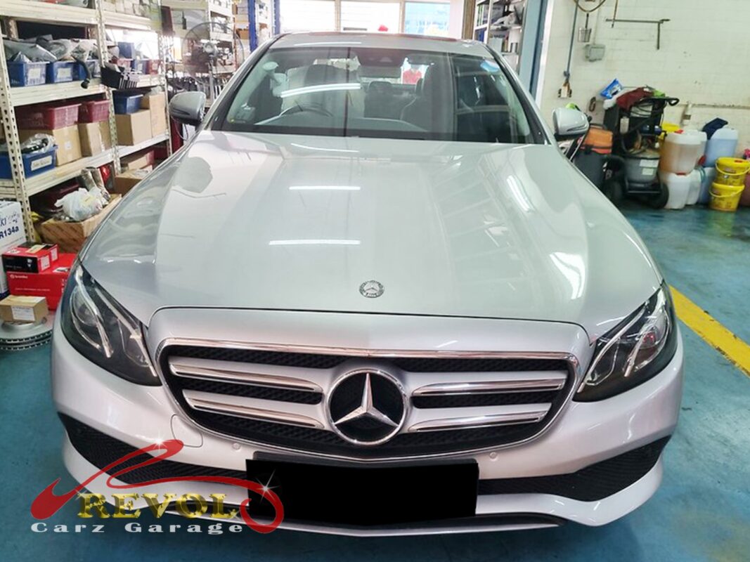 Mercedes-Benz E200 parked at the workshop for routine maintenance.